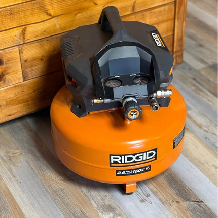 RIDGID 6 Gal. 150 PSI Portable Electric Oil-Free Jobsite Pancake Air Compressor with Dual Pressure Gauges and 2-Quick Couplers